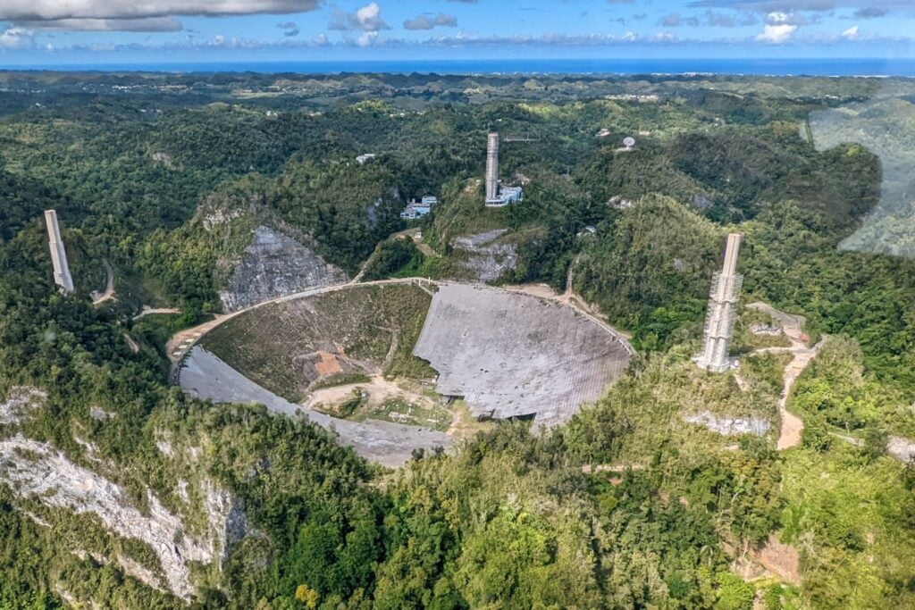 The Arecibo Telescope being demolished in December 2021.