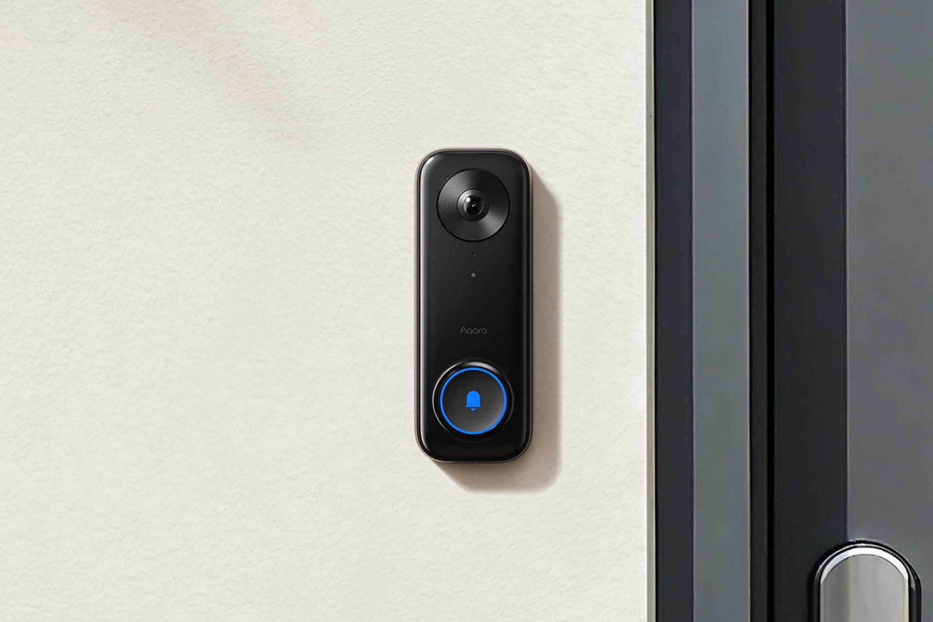 The Aqara Doorbell Camera G400, a rectangular doorbell camera with rounded corners, a camera lens at the top end and a doorbell button at the bottom.