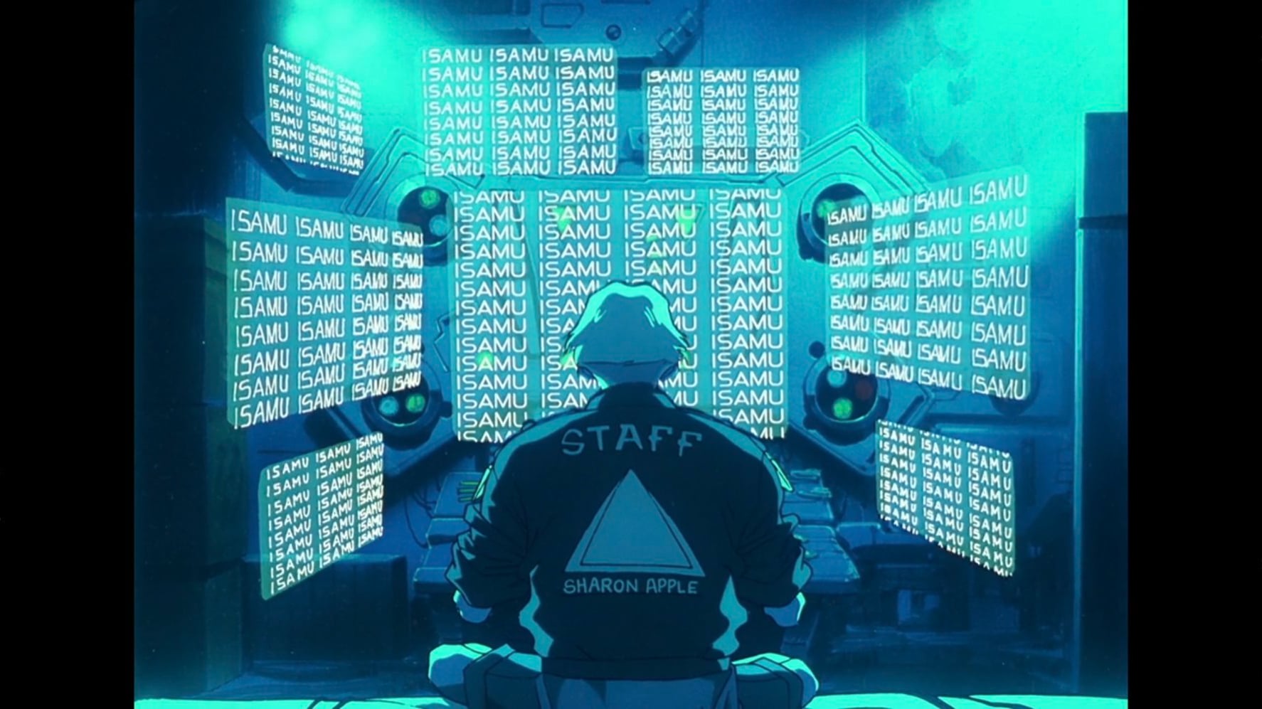 Macross Plus still of Isamu's name repeating on Sharon Apple's monitor.