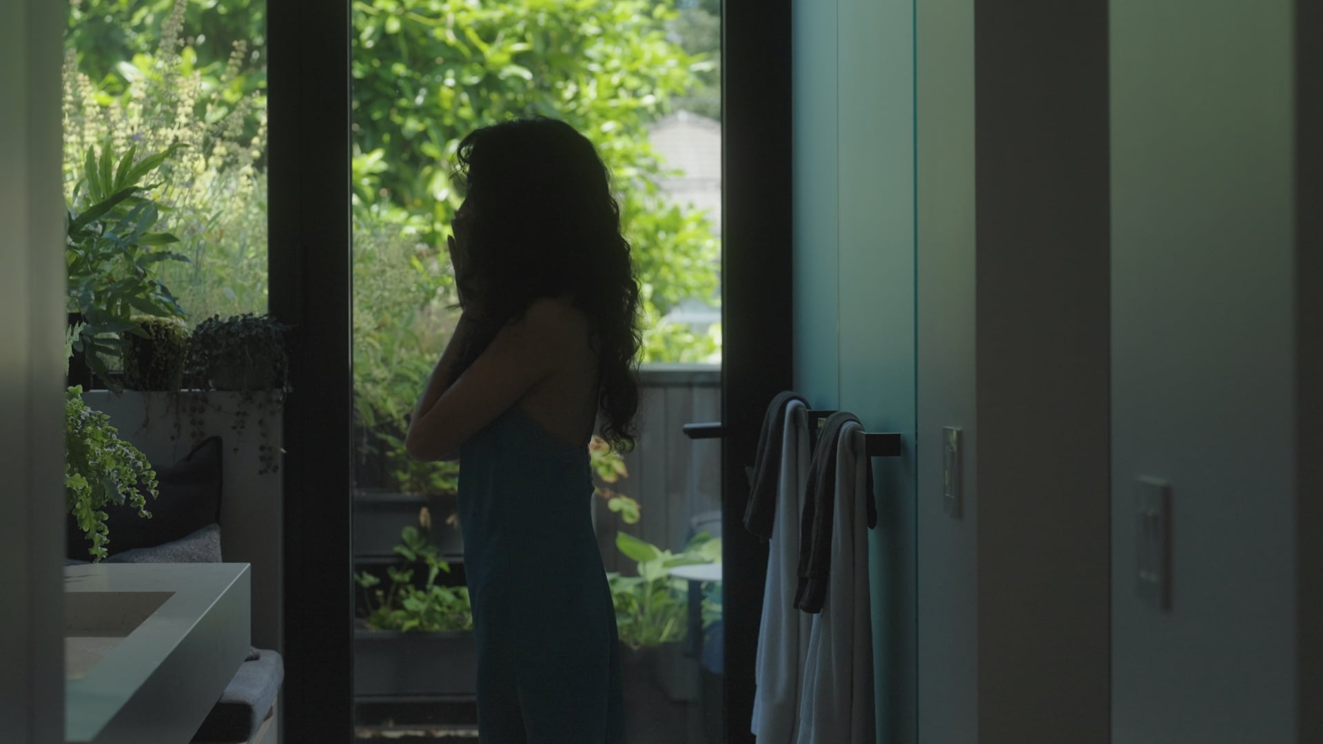 Prove You're Human still of an FMV of a woman washing her face.