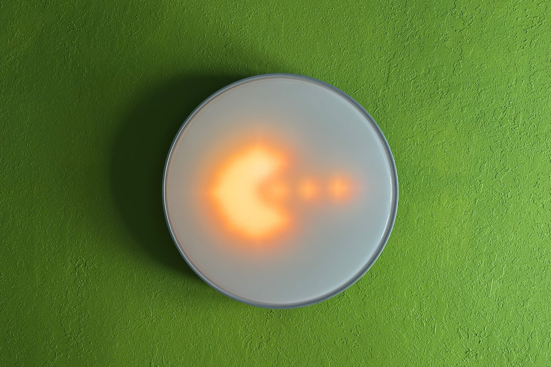 Govee Ceiling Light Ultra with an image of what looks like Pac-Man eating some dots.