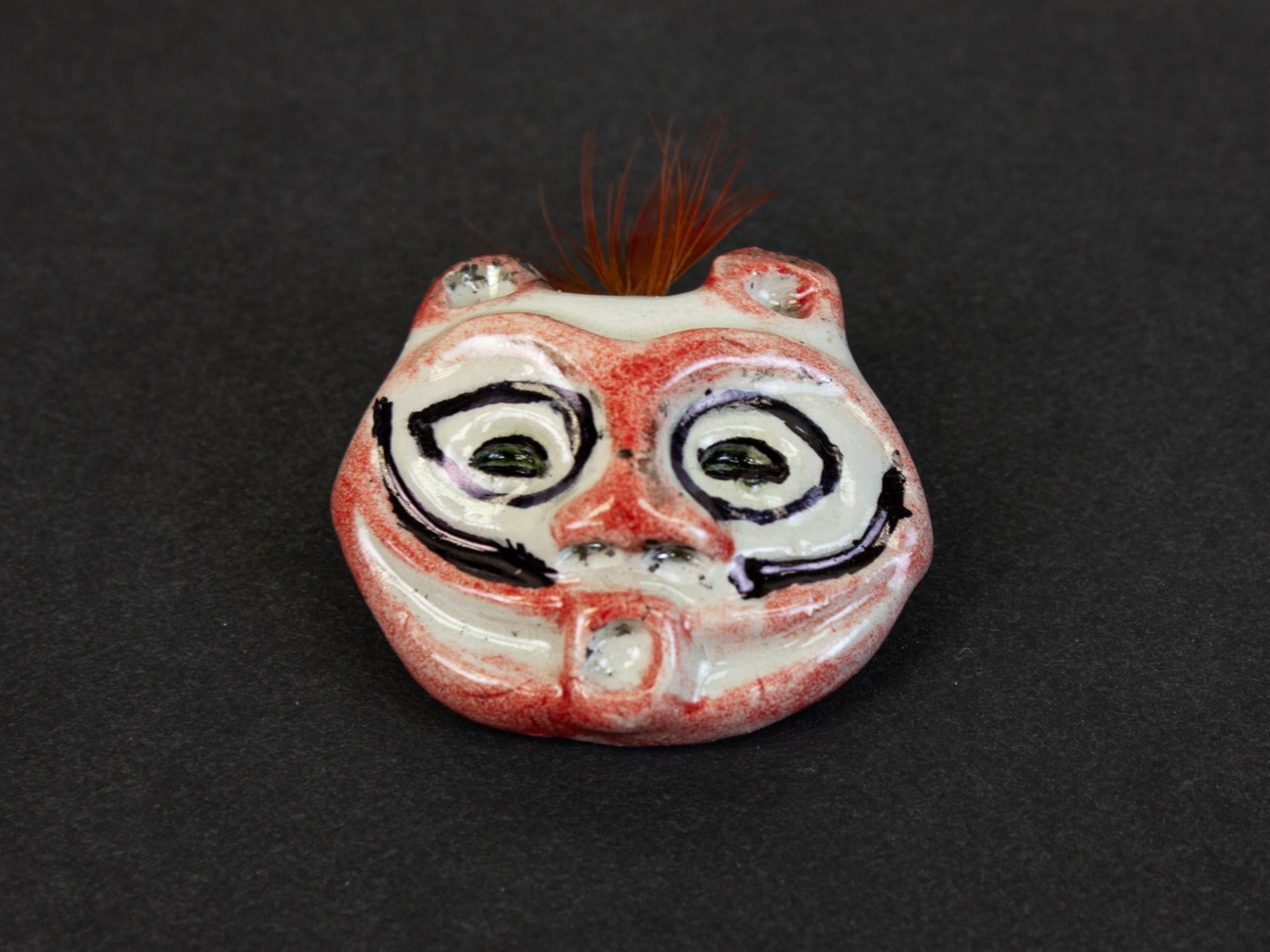 Oregon's contribution to the America 250 time capsule, a “She Who Watches” pin handcrafted by acclaimed Native American artist Lillian Pitt.