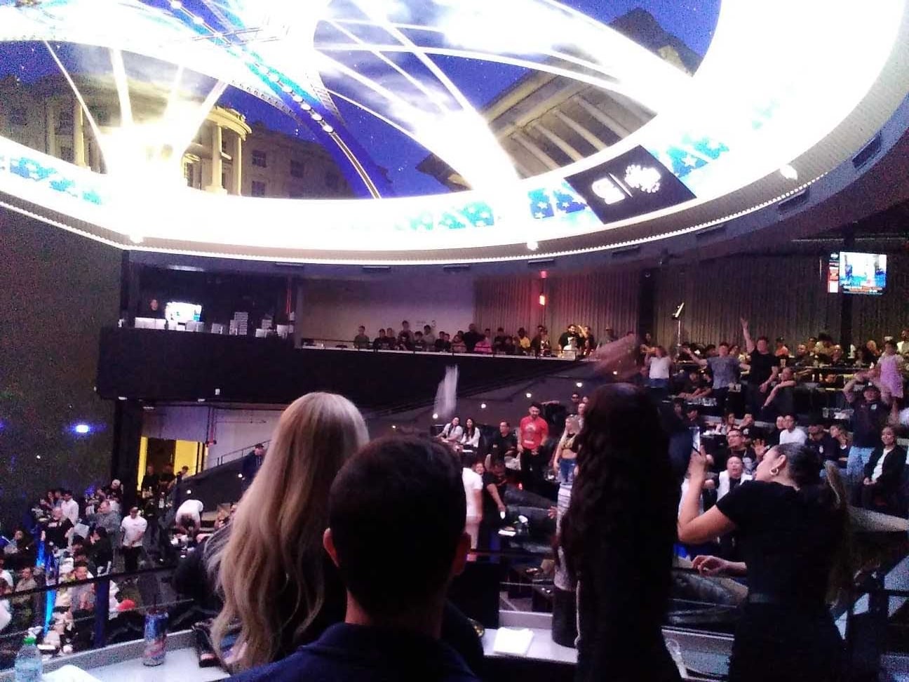 The Monster Girls throwing t-shirts down to the crowd