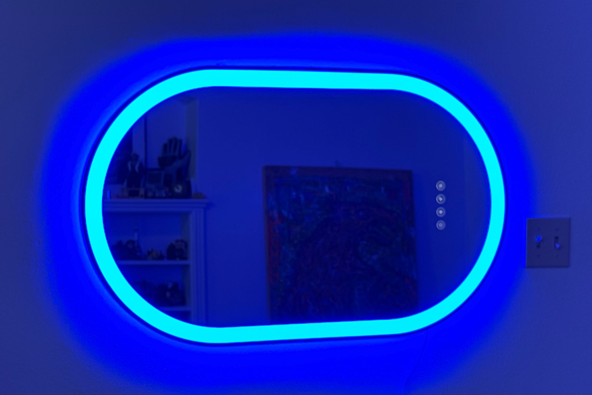 The Lifx smart mirror with its ring set to a blue color.