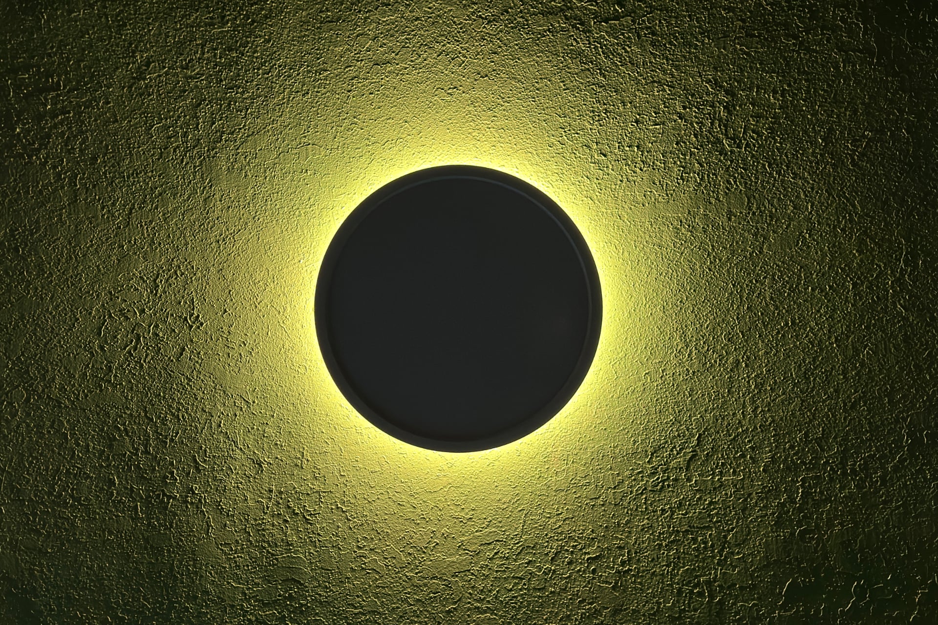 Nanoleaf Smart Multicolor Ceiling Light photographed from below with only the top light on, creating a dark circle in the center.