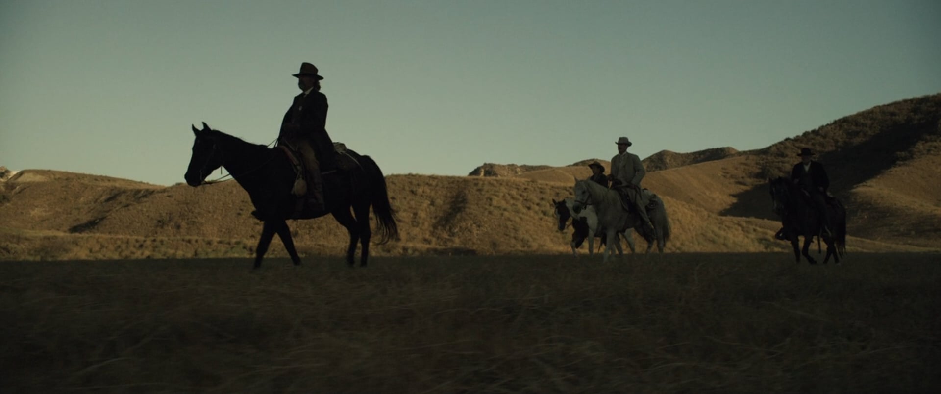 Bone Tomahawk still of its rescue team riding horses.