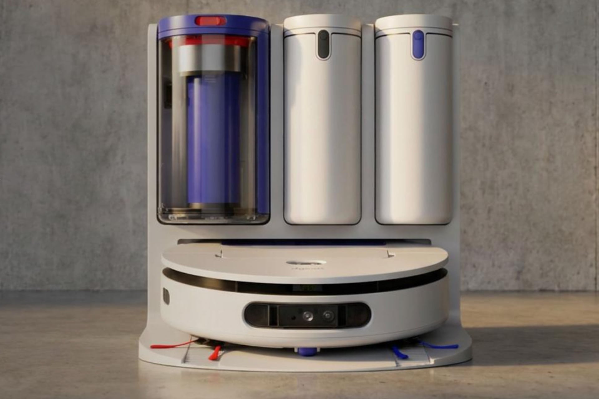 Dyson R3 Nurovi Spot+scrub in its dock. The bot has a large slit that spans the width of the robot, cut just below the top for LiDAR scanning, and a broad, pill-shaped black panel, presumably for AI vision cameras.