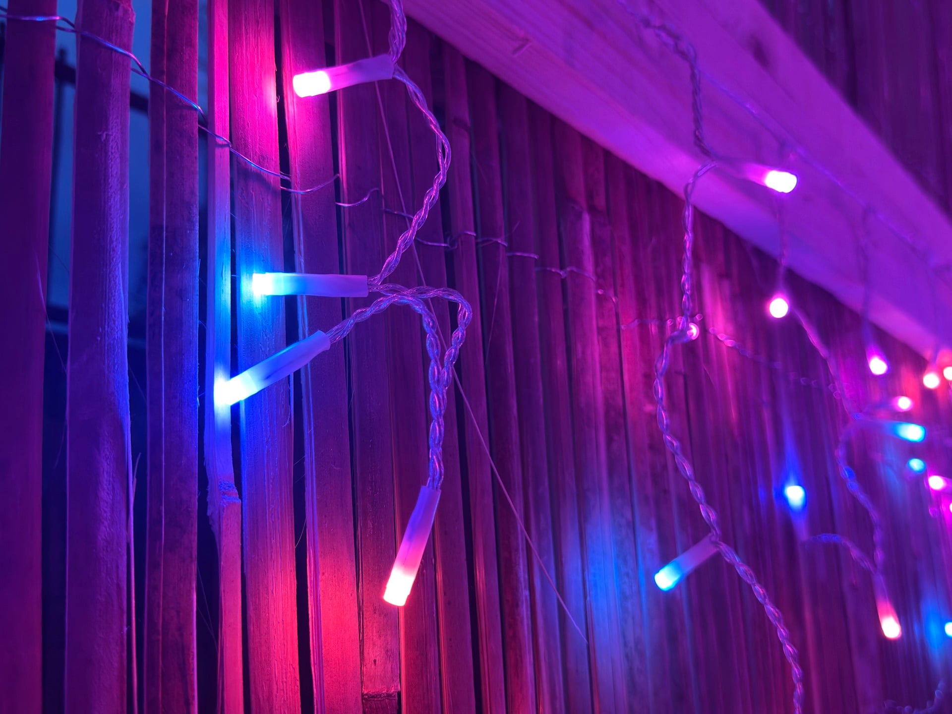 Image of the Philips Hue Icicle Lights, showing blue and pink colors.