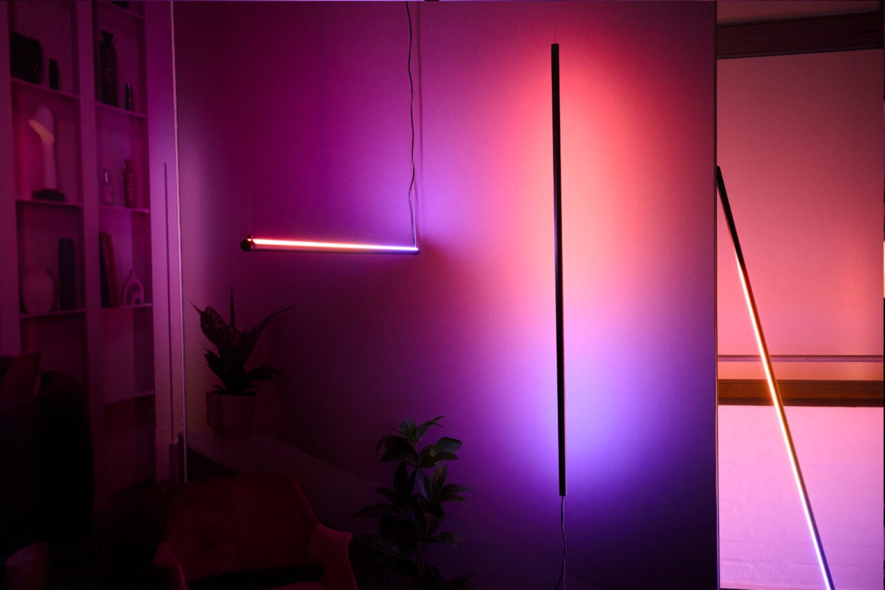 All three of the Signe lights. The pendant hangs on the left side, the pendulum is suspended upright, while the pole leans against a wall.